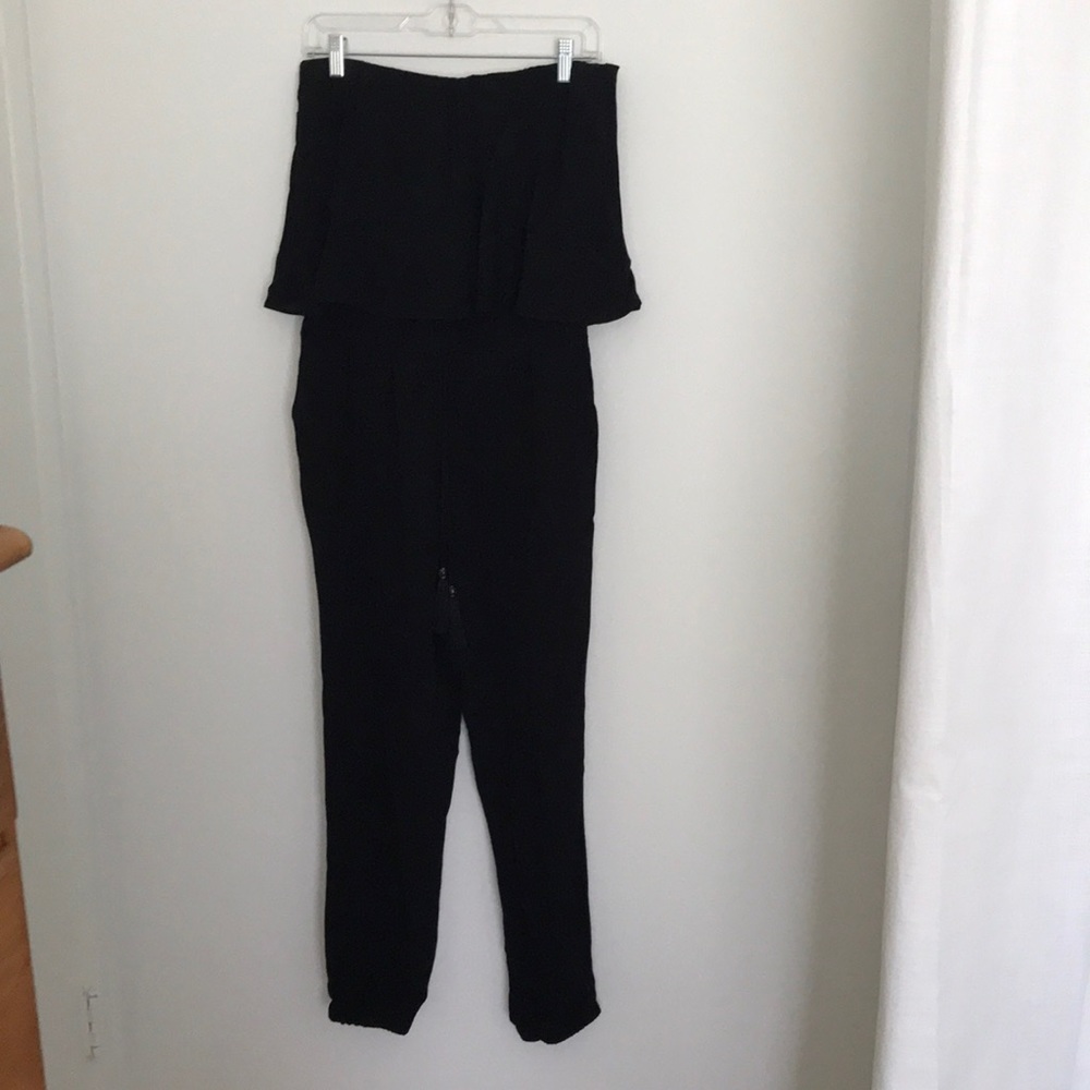 Black jumpsuit with ruffle top